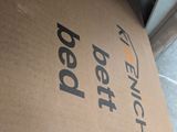 a cardboard box with a logo on it