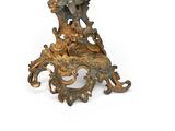 a small table with a bird on top of it