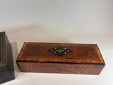 pair of antique wooden boxes on white background with gold trimming