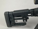 a close up of a toy gun with a flashlight on it