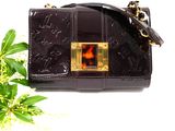 louis vu vu bag in black patent with gold hardware and tortoise shell