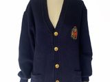 navy blue cardigan sweater with gold buttons on a mannequin dummy
