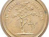 an old gold coin with a picture of a man on a horse