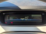 an image of a car dashboard with a digital display