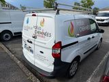 a van that is parked in a parking lot