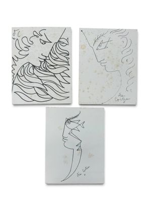 trois dessins représentant le visage d'une femme et celui d'un homme sur du papier blanc
