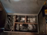 a metal box with a bunch of electrical equipment inside of it
