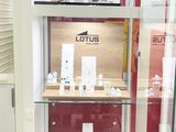 a glass display case with lots of items in it
