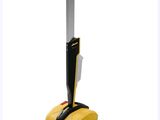 a close up of a vacuum cleaner with tools on a white background