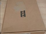 a box that is sitting on top of a wooden table