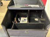 a black box that has a bunch of items inside of it