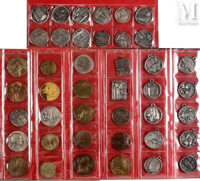 two rows of silver and bronze coins in a red case