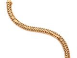 un bracelet en or sur fond blanc