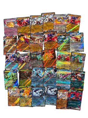 a pile of pokemon cards sitting on top of each other