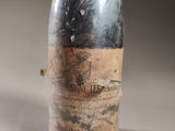 a bottle of wine that is sitting on a table