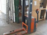 a forklift that is sitting in a garage