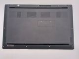 a black laptop with a small hole in the back