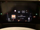 an image of a car dashboard with a digital display