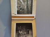 two pictures of a building in a box on a table