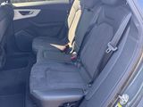 the back seats of a car are empty in the parking lot