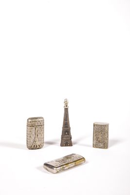 a small group of objects sitting on a white surface