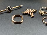 five different types of rings on a table