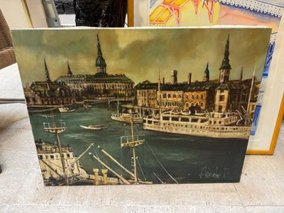 a picture of a painting of a city by the water