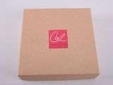 a brown box with a red logo on it