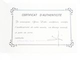 a certificate with a picture of a person holding a cell phone