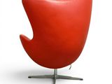 an image of a red egg chair on a white background