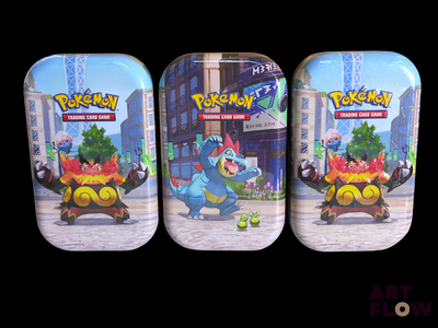 three tins with pokemon characters on them on a black background