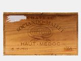 a wooden plaque with a picture of a fish on it