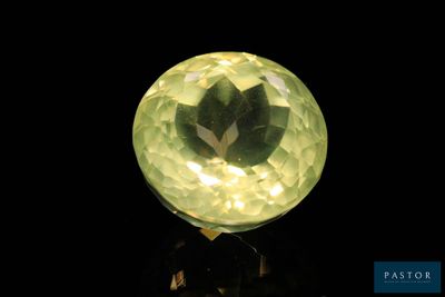 an image of a yellow diamond on a black surface