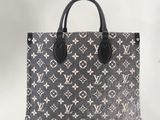 Sac cabas Louis Vuitton en toile Monogram avec poignées en cuir noir
