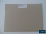 a close up of a piece of paper with a sticker on it