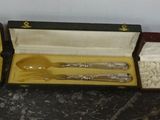 three different types of silverware in a case
