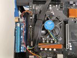 a close up of a computer motherboard with wires attached