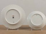 two plates that are sitting on a table