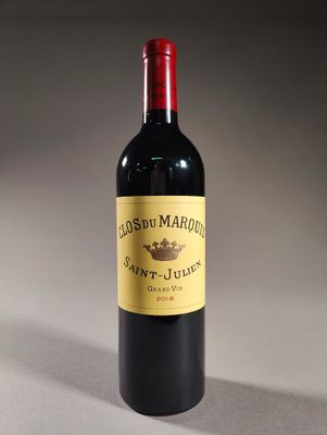 a bottle of wine that is sitting on a table