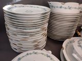 a lot of plates that are stacked on top of each other