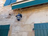 a light that is on the side of a building