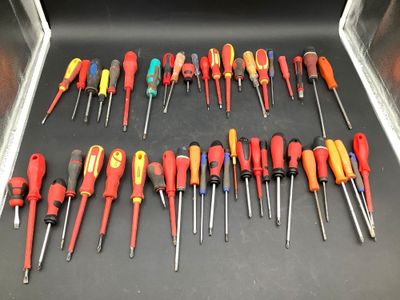 many different types of screwdrivers in a box