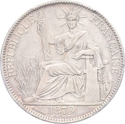 une vieille pièce d'argent sur laquelle figure la statue d'une femme assise sur une chaise
