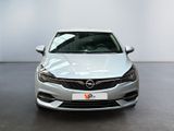 the front view of a silver opel parked in a showroom