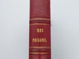 a red book that is sitting on top of a table
