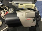 a camera that is sitting in a case on the floor