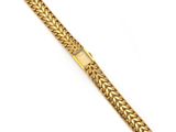 un bracelet en or 18 carats à maillons de type « curb »