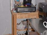 an image of a kitchen with a coffee maker on a table