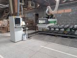an image of a machine that is working on a piece of wood