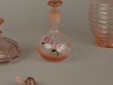 three glass vases that are sitting next to each other